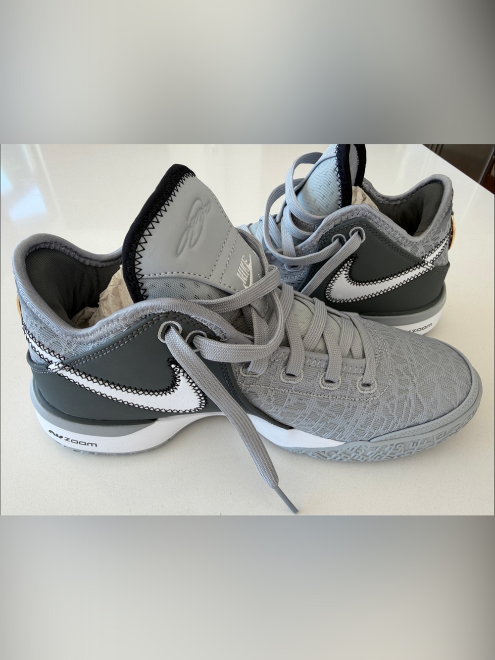 Zoom Le Bron Nike Kids Grey Sneakers with White and Gold Accents